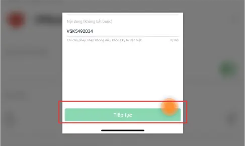 Nhấn Tiếp Tục trong ứng dụng ngân hàng để kiểm tra và xác nhận giao dịch